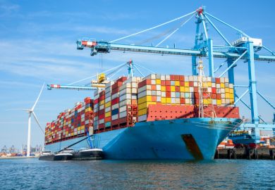 A heavily loaded container ship in Rotterdam, symbolising internationalisation