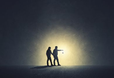 Two people walk in darkness with lamp illuminating their path Two people walk in darkness with lamp illuminating their path