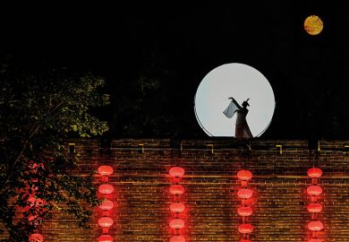 Asian woman on a wall in moonlight Asian woman on a wall in moonlight