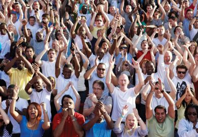 Crowd of people cheering