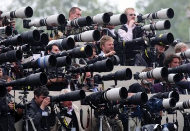 Crowd of press photographers aiming cameras Crowd of press photographers aiming cameras