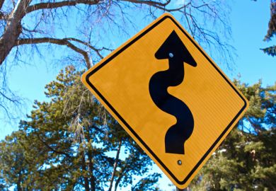 Curvy road ahead sign