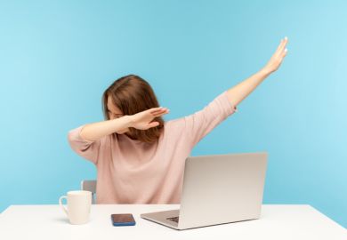 A woman watching a computer and doing a dab dance, symbolising online learning