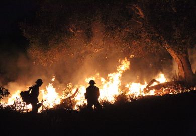 December 11, 2017 - Fire crews, using controlled burns, create a barrier in the foothills of Carpinteria, California, in the hopes of containing the Thomas fire in Southern California.