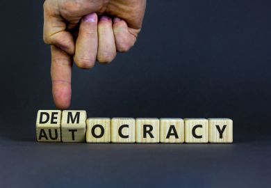 The word "democracy" turns into "autocracy" The word "democracy" turns into "autocracy"