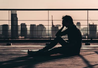 A depressed person on a roof