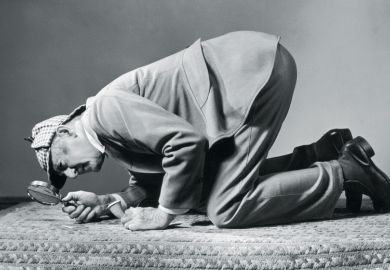 Detective inspects floor