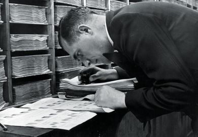 Detective looking at fingerprints