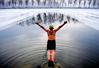 Diving into a cold lake