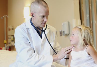 Doctor with child patient Doctor with child patient