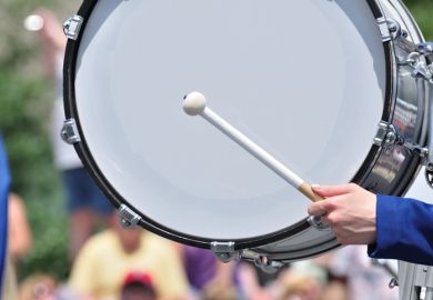 Drummer Playing Bass Drum in Parade Drummer Playing Bass Drum in Parade