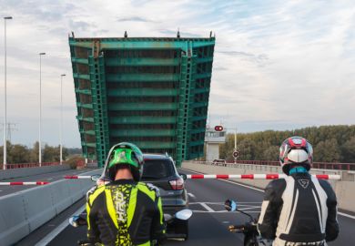 Dutch drawbridge raising to allow shipping through