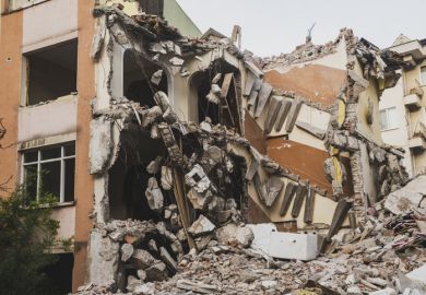 A collapsed apartment block after an earthquake in Turkey