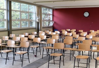 Empty chairs illustrating drop in enrolment at English language school in the UK