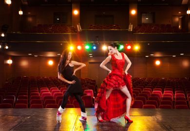 Dancers perform in an empty theatre, illustrating vacuous university strategy