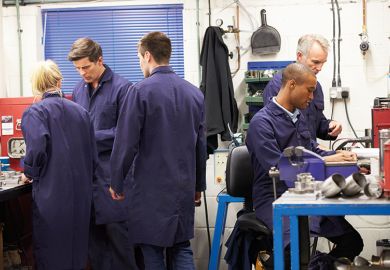 Engineers in workshop