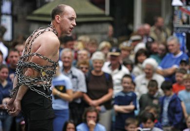 escape artist in chains