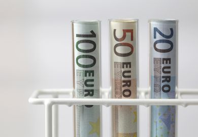 Euro banknotes in test tubes