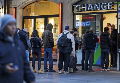 people queuing for currency at a bureau de change