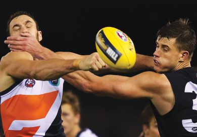 Australian Rules football players clash over ball Australian Rules football players clash over ball, illustrating gag clause in redundancy contracts