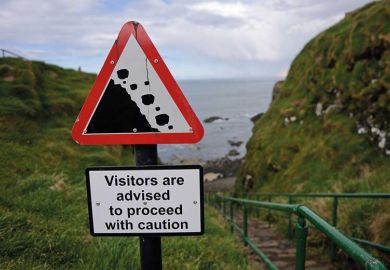 falling-rocks-warning-sign falling-rocks-warning-sign
