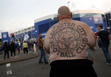 Shirtless football fan with Leicester City back tattoo Shirtless football fan with Leicester City back tattoo