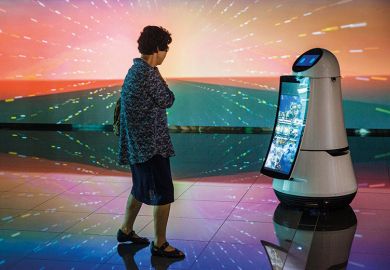 Woman looking at robot Woman looking at robot
