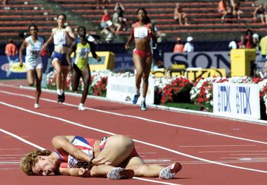 female runner lays on the floor