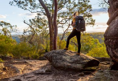 Female hiker bushwalking in Australian bushland