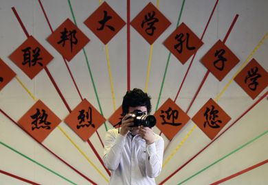 A photographer with a camera A photographer with a camera