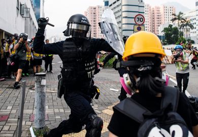 Police clash with protesters in Kowloon Bay, Hong Kong in August 2019 Police clash with protesters in Kowloon Bay, Hong Kong in August 2019