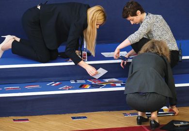 Workers sort flags to mark where European leaders will stand for the family photo during EU summit on March 22, 2019 in Brussels, Belgium Workers sort flags to mark the spots where European leaders will stand for the family photo during EU summit on March 22, 2019 in Brussels, Belgium