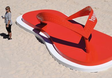 Giant flip flop on beach