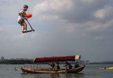Man on scooter jumps into lake in China
