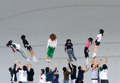 Chinese students throwing other students in air