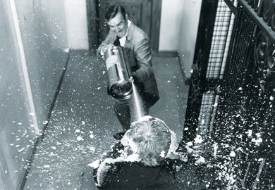 Man blasts person with foam