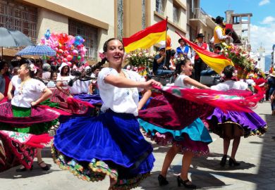Folk dancers at the parade, Cuenca, Ecuador