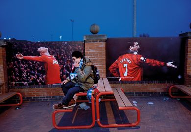 football fan sitting alone