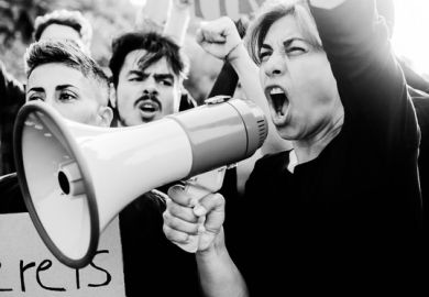 A woman with a megaphone, symbolising free speech