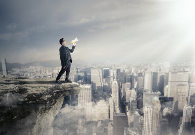 A man with a megaphone on a rooftop, symbolising free speech