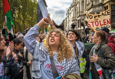 A woman chants at a pro-Palestine protest in London A woman chants at a pro-Palestine protest in London