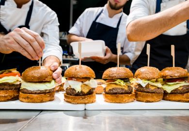 front view of many delicious juicy hamburgers