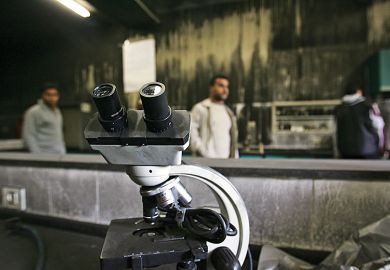 A microscope on a Gazan background A microscope on a Gazan background