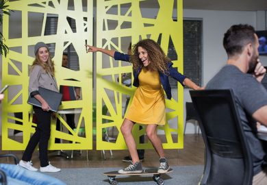 Woman skateboarding in office Woman skateboarding in office