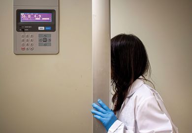 A female science student hides her face