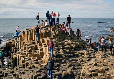Crowd of people on the Giant's Causeway, Northern Ireland, illustrating how students may still look elsewhere to study if the Maximum Student Number (MaSN) cap was relaxed. Crowd of people on the Giant's Causeway, Northern Ireland, illustrating how students may still look elsewhere to study if the Maximum Student Number (MaSN) cap was relaxed.