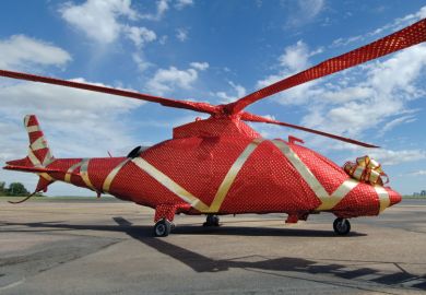 Gift-wrapped helicopter on launch pad