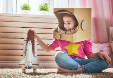 Girl in astronaut costume