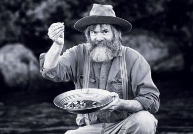 Gold rush prospector with gold nuggets