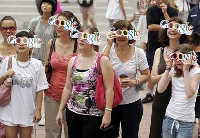 People wearing Google glasses